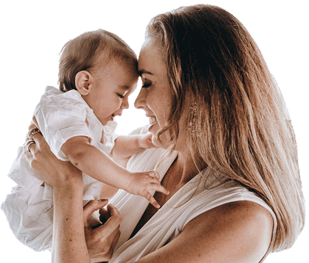 mother looking up to baby's face smilling